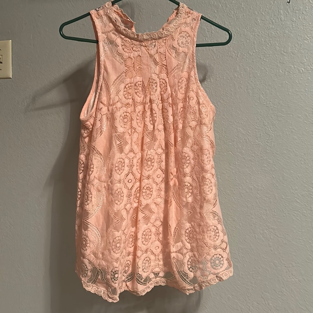 Pink blouse with lace overlay